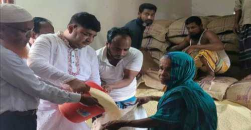 নগরকান্দার তালমায় ভিজিএফ এর চাল বিতরণ