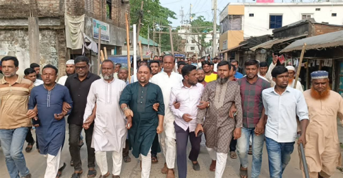 মদনে বিএনপি নেতাকে নির্যাতন করার প্রতিবাদে বিক্ষোভ মিছিল 